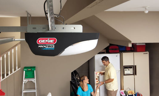 Genie MachForce garage door opener installed in a garage with people inside the garage