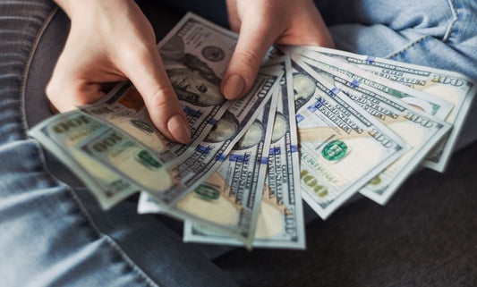 Hands holding money