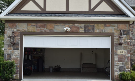 Entrance to a garage with the garage door opening