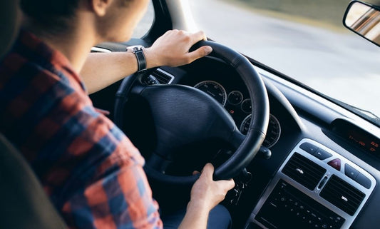 Person driving a vehicle