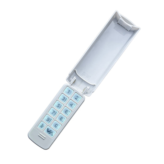 A white flip phone keypad cover or replacement keypad shell shown open against a plain white background.
