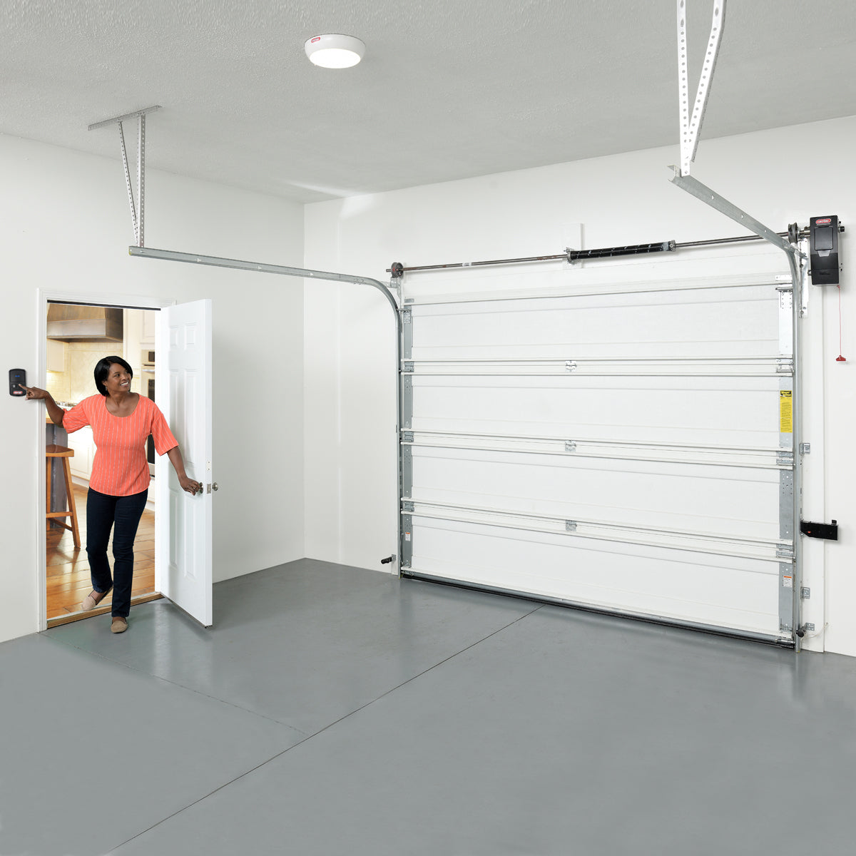 Genie side/wall mount garage door opener installed in a garage